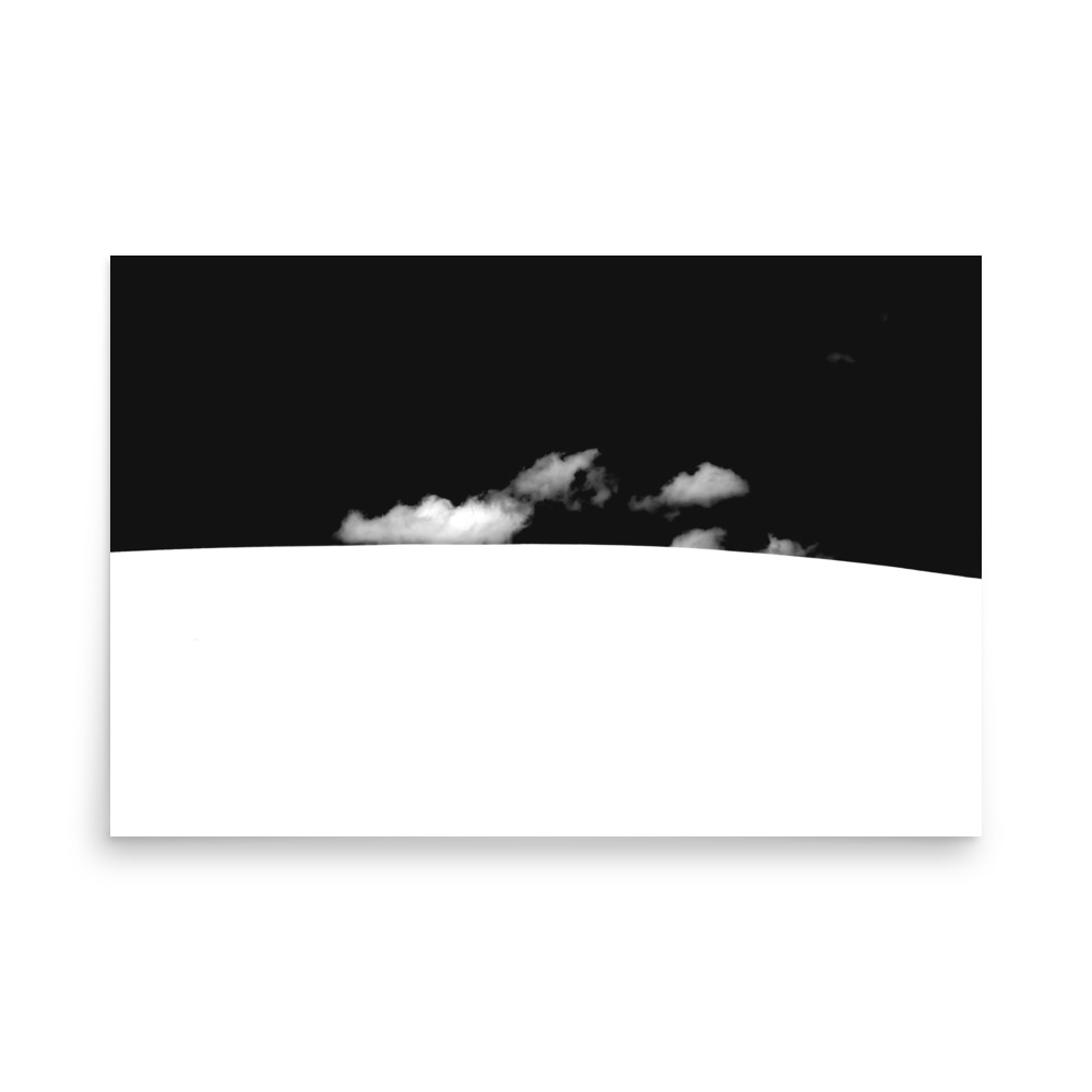 The 'Waenhuiskrans Dunes Minimalistic' print showcases a stark minimalistic photo of a solid white coastal dune curve under floating white clouds set against a deep black sky.